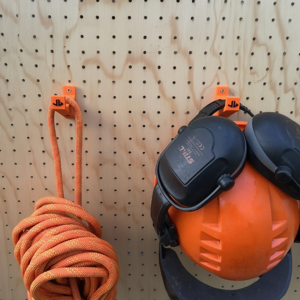 Multi-purpose hook holding rope and helmet
